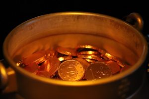 Decorative image of a bucket of coins to represent value