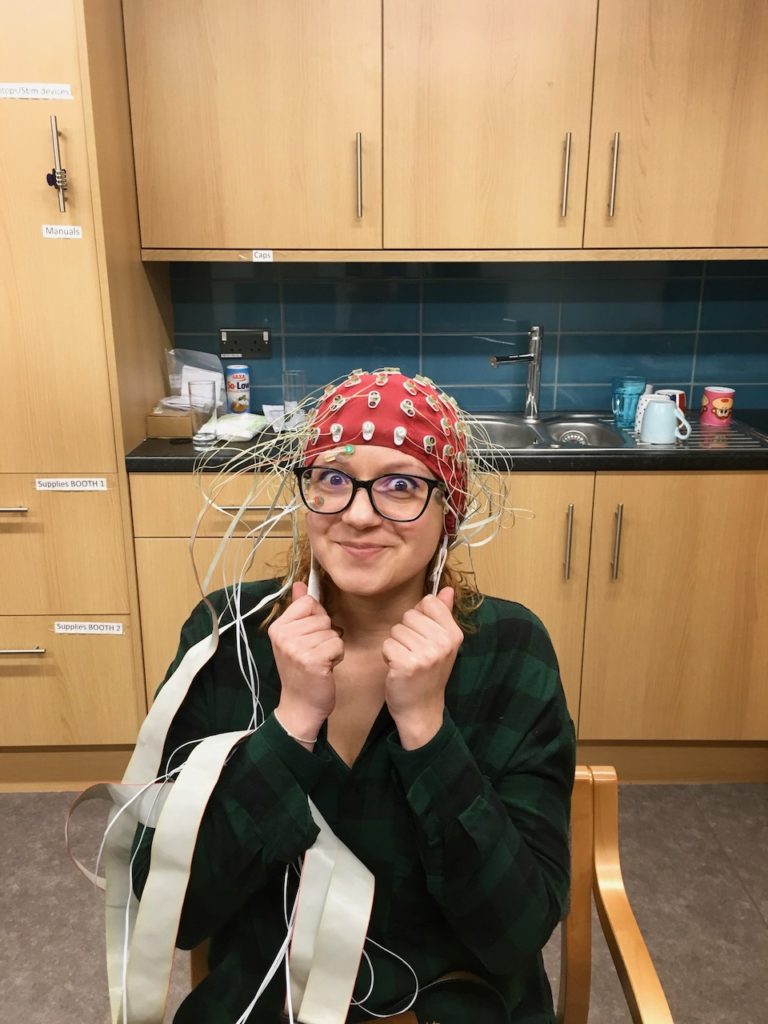 Camen Ionita wearing an EEG cap
