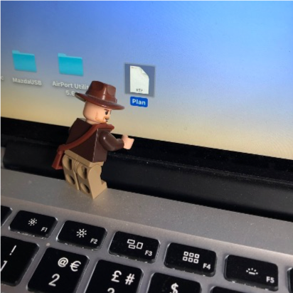 A lego minifig on a Mac laptop