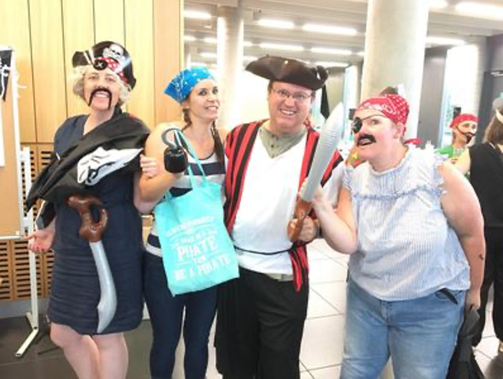 Photo of 4 adults drewssed as pirates